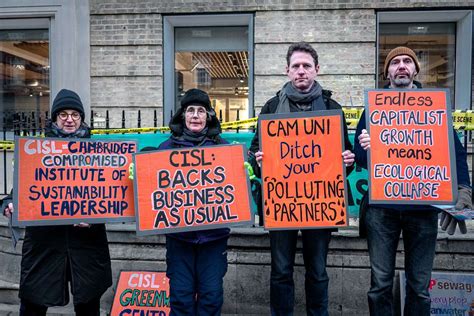 Environmental campaigners hold ‘greenwashing’ protest at Cambridge ...