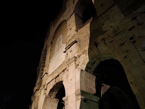 Premium Photo | Colosseum rome interior view at night