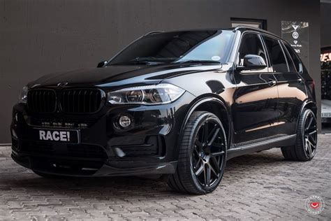 Blacked Out BMW X5 with Aftermarket Wheels