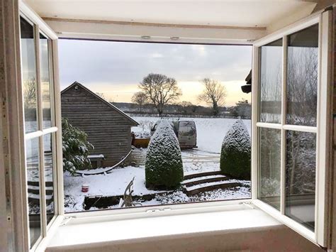 A snowy view through Internorm Windows | Windows, Architecture, Country ...