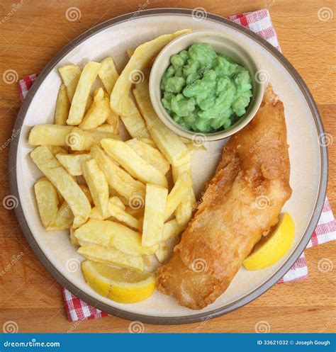 Fish, Chips and Mushy Peas stock photo. Image of crispy - 33621032