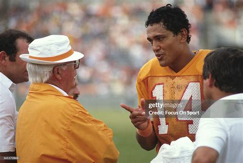 Head coach John McKay of the Tampa Bay Buccaneers talks with his ...