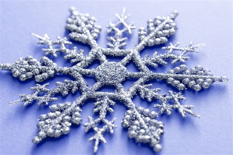Photo of Ornamental silver glitter Xmas snowflake | Free christmas images