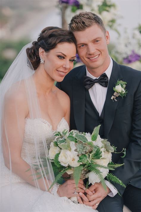 Backstreet Boys' Nick Carter and Lauren Kitt take a moment to hold ...