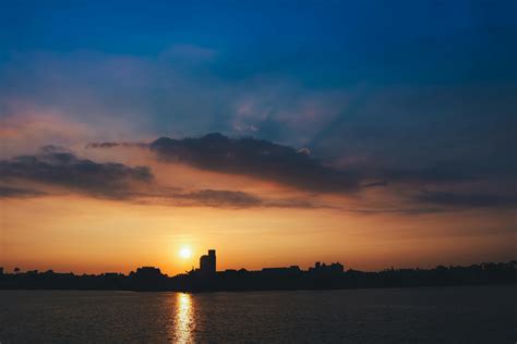 Scenic View Of Lake During Sunset · Free Stock Photo