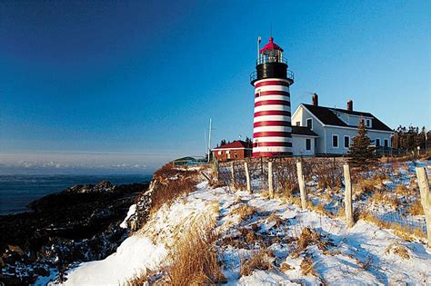 Morning sunlight strikes the West Quoddy Head Lighthouse, Lubec, Maine | Maine lighthouses ...