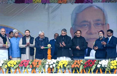 Bihar Chief Minister Nitish Kumar lights a lamp during the Second phase ...