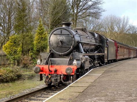 44871 Ex-LMS Stanier Class 5 locomotive, 44871, waits at Summerseat Station, en-route for Bury ...