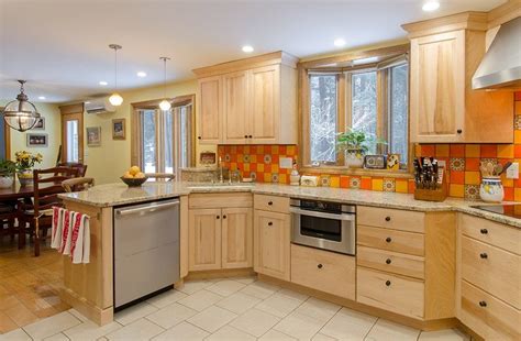 Country Kitchen - natural birch cabinets, granite countertops, corner cooktop and corner sink ...