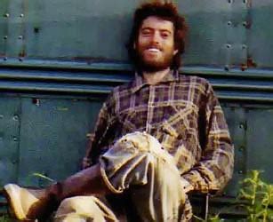 Chris McCandless sitting outside the bus that he would eventually die in, just outside the ...