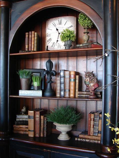 Old world leather bound books used in decorating a book shelf at The White Hare. - Shelf ...