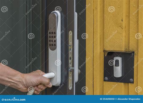 View of Man`s Hand Opening Entrance Door with Digital Lock. Stock Photo - Image of modern, door ...