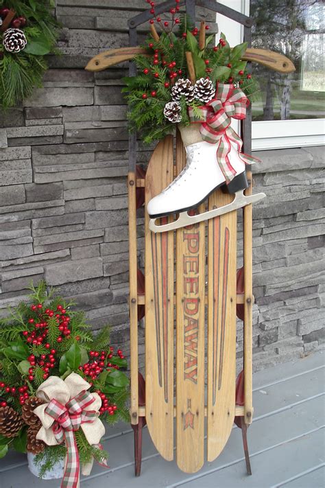 Vintage Sleds and skates always add heartwarming charm to porches and ...