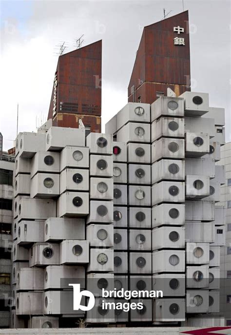 The Nakagin Capsule Tower is located in the Shimbashi district of Tokyo, Japan Nakagin Capsule ...