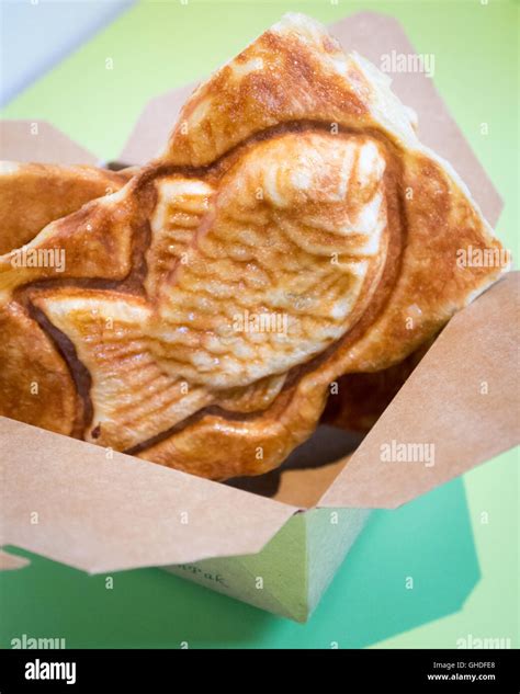 A taiyaki, a Japanese fish-shaped cake filled with red bean paste, from Snowy Village Dessert ...