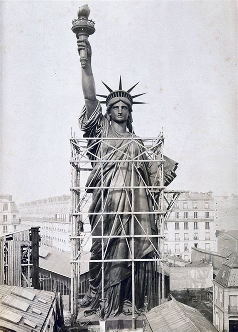 The Statue of Liberty under construction in Paris. It was shipped to the US as a gift and symbol ...