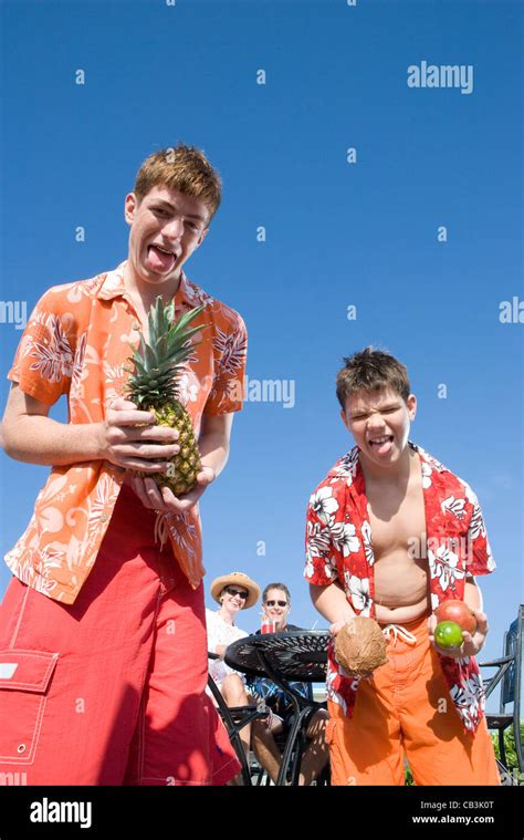 Portrait of a family enjoying tropical vacation Stock Photo - Alamy