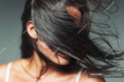 Wind blowing hair in womans face — Studio Shot, 35 39 years - Stock ...