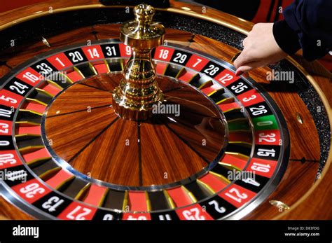 Spinning casino roulette wheel Gambling and casino concept Stock Photo - Alamy