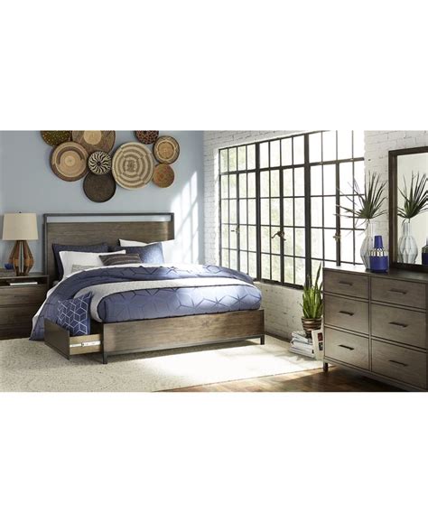 a bedroom scene with focus on the bed and dresser