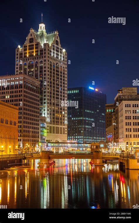 Downtown Milwaukee reflected in the Milwaukee River at night, Milwaukee, Wisconsin Stock Photo ...