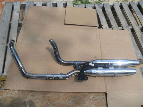 Sell 07-12 OEM HARLEY FAT BOY EXHAUST 64710-08B 64709-08B in Magee ...