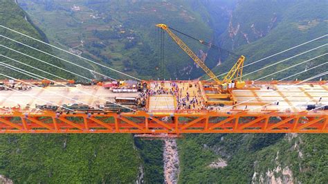 China drives ever upwards with world's highest bridge