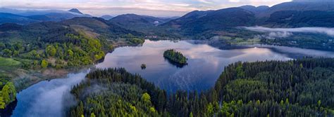 Photographs, route description and map of a circular walk along Loch Ard to Kinlochard returning ...