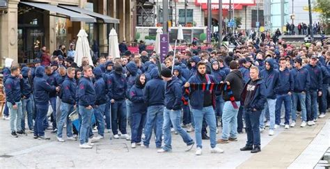 Basel fans arrive for Manchester United Champions League clash… all dressed in identical ...