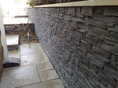 TIER® Black Slate Retaining Wall..... | Stone cladding, Slate wall tiles, Backyard retaining walls