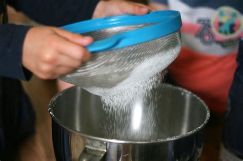 Using a spatula, gently fold the flour into your egg/sugar mixture. Make sure you can’t see any ...