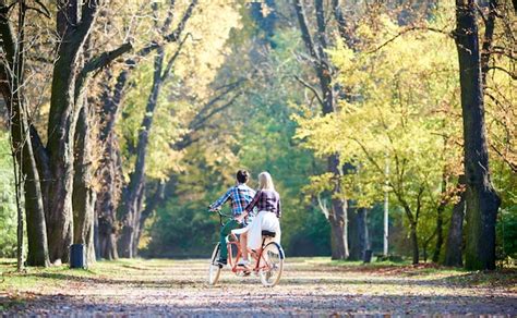 Premium Photo | Couple on tandem bike