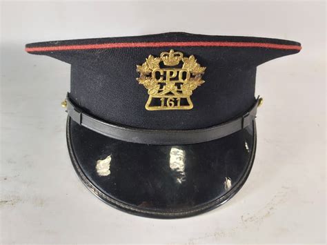 VINTAGE CANADA POST UNIFORM WITH HAT RARE SIZE - Kastner Auctions