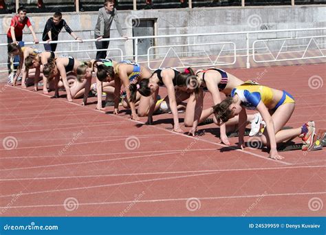 Girls On The Start Of The 100 Meters Race Editorial Stock Image - Image ...