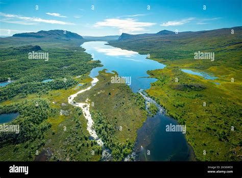 Aerial view of lakes and mountains in vast Arctic landscape. Bietsavrre lake in Sarek National ...