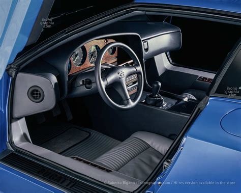 The interior of the Bugatti EB110 with the EB logo on the steering ...