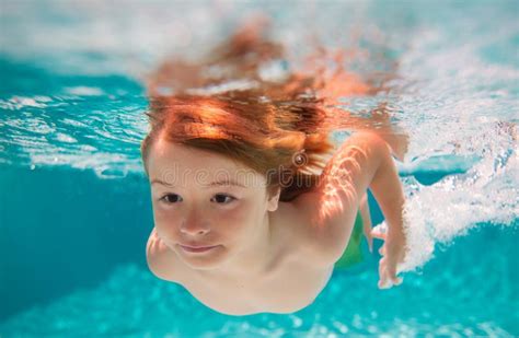 Child Boy Swim Under Water in Sea. Kid Swimming in Pool Underwater Stock Photo - Image of splash ...