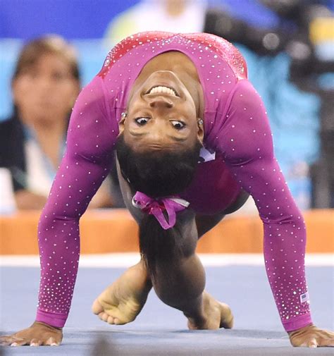 Simone Biles claims gold at 2014 world championships