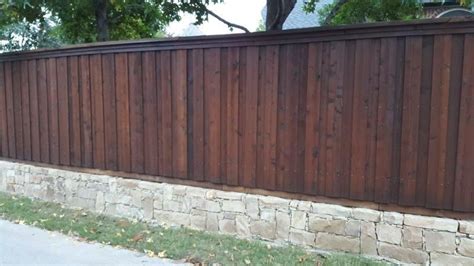 8 ft dark wooden fence | 1000 - Modern Design in 2020 | Staining wood fence, Fence stain, Cedar ...