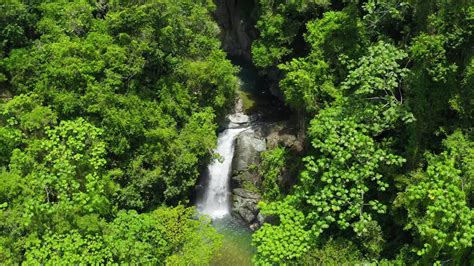 Premium stock video - Jima jump waterfalls, bonao. dominican republic. aerial reverse