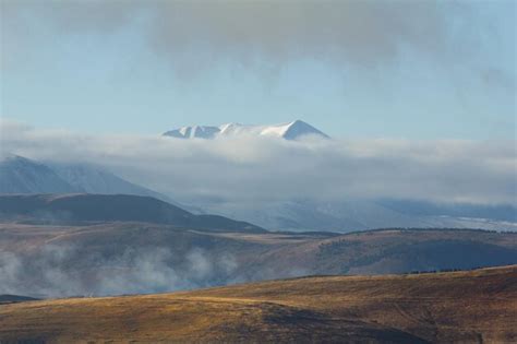 Premium Photo | Mountain in the clouds