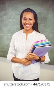 29,998 Teacher holding books Images, Stock Photos & Vectors | Shutterstock