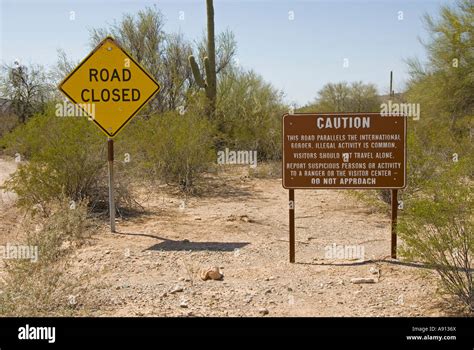 Warning signs, near International border, Lukeville, Arizona,USA, near ...