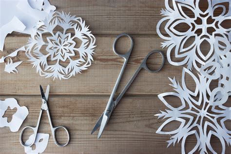 How to Cut Snowflakes From Paper or Fabric