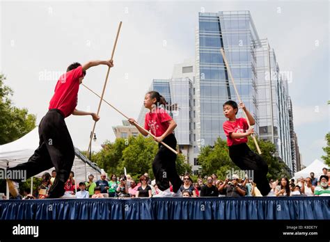 US Wushu Academy students performing Kung fu at a public event - Washington, DC USA Stock Photo ...