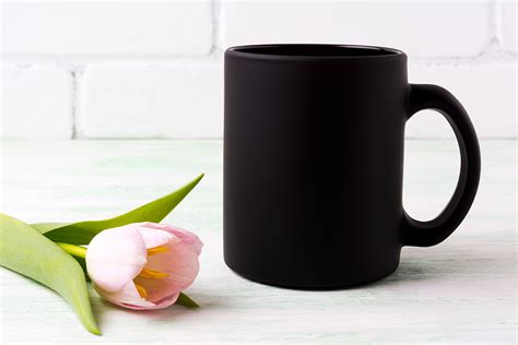 Black Coffee Mug Mockup with Pink Tulip Graphic by TasiPas · Creative Fabrica