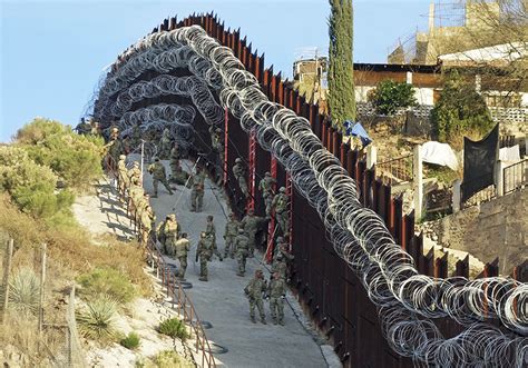 Latest: Border officials explain added wire to Nogales wall | AP News