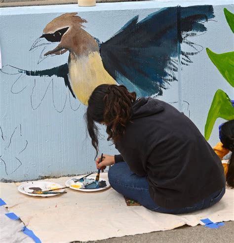 Community mural painting unites neighborhoods