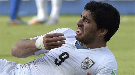 Luis Suarez suspended for nine matches by FIFA for biting incident - LA Times