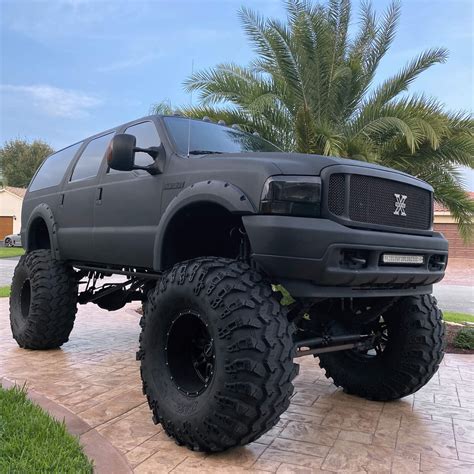 Lifted 2004 Ford Excursion Monster Truck On 49” Super Swampers - offroadium.com